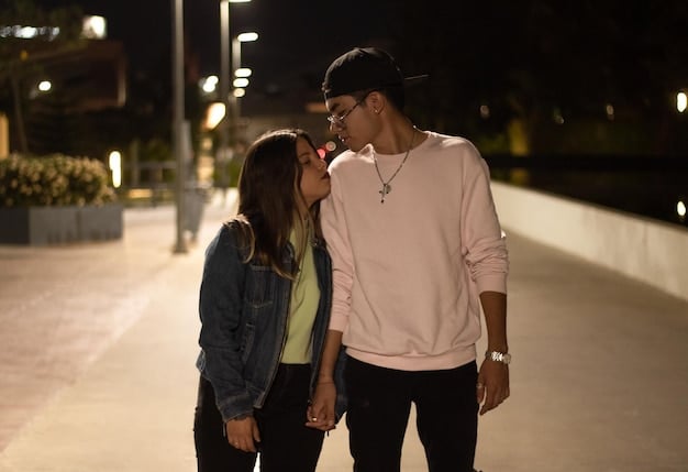 A medium shot of a couple in a K-drama, the female lead looking down shyly while the male lead gently lifts her chin, anticipation building, soft focus on their faces.