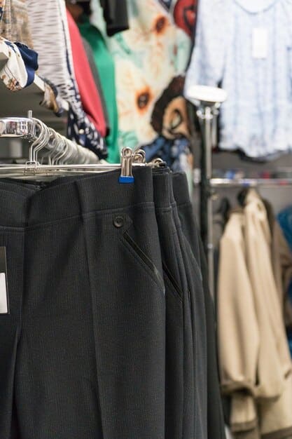 A rack of affordable, stylish clothing items, including oversized blazers, wide-leg pants, and knitwear, suitable for recreating Korean drama fashion trends on a budget, displayed in a well-lit fashion retail store.