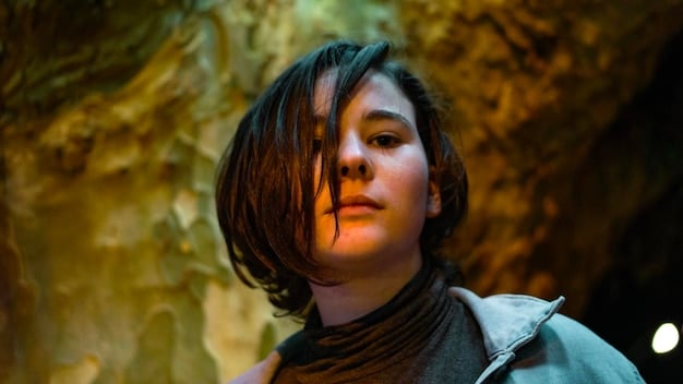 Close-up shot of a woman with a sleek bob hairstyle, inspired by a J-drama character. The hair is dark and shiny, with subtle layers and a side part.