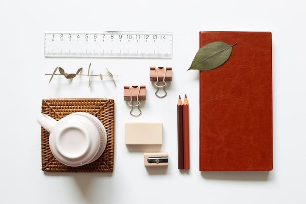 A detailed flat lay of Japanese minimalist accessories that would appeal to the US market in 2025: a sleek, transparent tote bag, a delicate silver chain necklace, a modern designed watch, and a pair of sophisticated, round-frame glasses, all laid out on a light wooden surface.