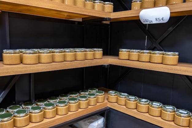 An organized shelf filled with various Japanese cooking ingredients: different brands of soy sauce, mirin, sake, rice vinegar, and miso paste in a clean, brightly lit Asian grocery store aisle.