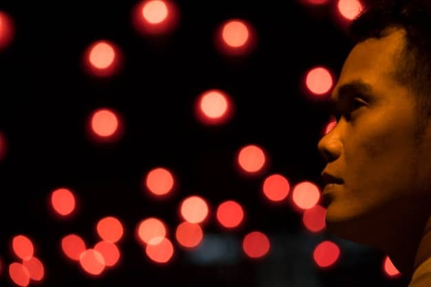 Close-up shot of an actor delivering a powerful monologue on stage, bathed in dramatic lighting. The actor's face is filled with emotion, and the background is blurred to emphasize their performance.