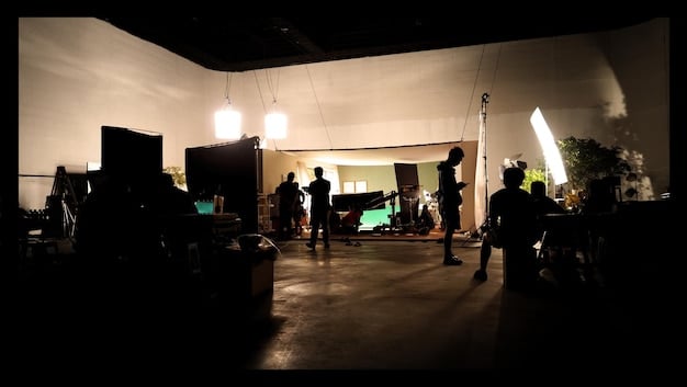 A wide shot of a stage setting, showing the use of lighting and set design to create an atmosphere that enhances the thematic impact of  , contributing to the performance's overall mood.